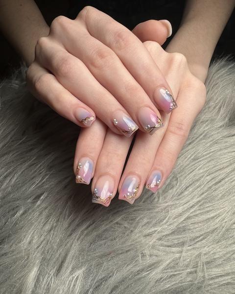Pink and blue aura gradient nails with gold line art and pearl accents, a short square set from 88 Nails Lewisville